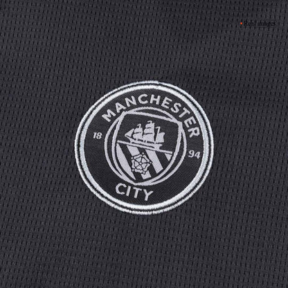 Παιδική φανέλα ποδοσφαίρου Manchester City εκτός έδρας (φανέλα+σορτς+κάλτσες) 2025/26 μαύρη